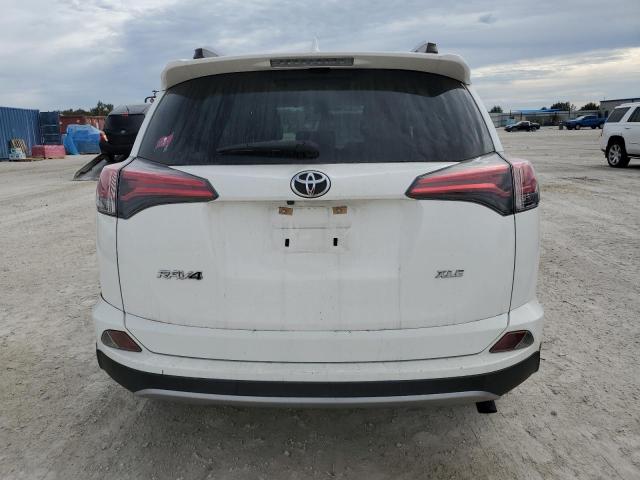 Photo 6 from auction – 2017 TOYOTA RAV4 XLE with VIN JTMWFREV6HJ138424