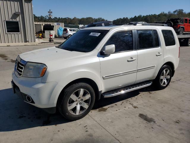 HONDA PILOT TOUR 2014 with VIN 5FNYF3H91EB001558 - Photo from auction