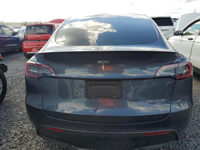 Photo 6 from auction – 2022 TESLA MODEL Y with VIN 7SAYGDEF2NF448674