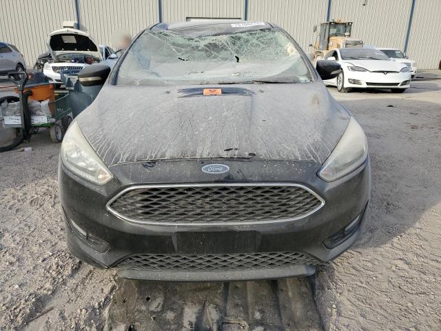 Снимка 5 от търг – 2015 FORD FOCUS SE с VIN 1FADP3K25FL366188