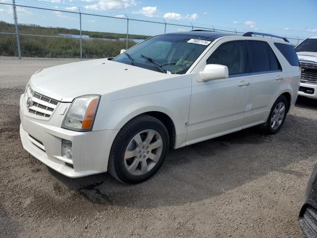CADILLAC SRX 2009 with VIN 1GYEE637390103858 - Photo from auction