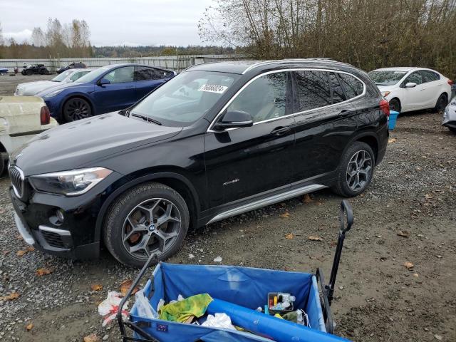 BMW X1 XDRIVE2 2018 with VIN WBXHT3C3XJ5F93281 - Photo from auction