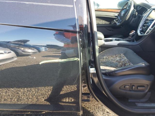 Photo 13 from auction – 2013 CADILLAC SRX PERFOR with VIN 3GYFNDE30DS507849