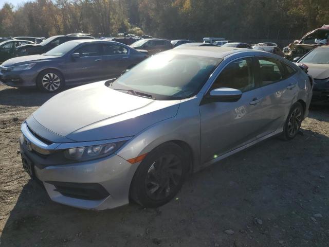 HONDA CIVIC EX 2018 with VIN 2HGFC2F74JH547384 - Photo from auction