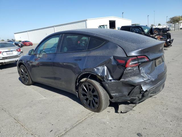 Photo 2 from auction – 2023 TESLA MODEL Y with VIN 7SAYGAEE0PF696057