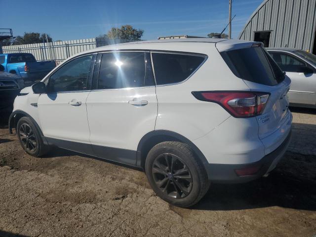 Photo 2 from auction – 2017 FORD ESCAPE SE with VIN 1FMCU9GD1HUC25817