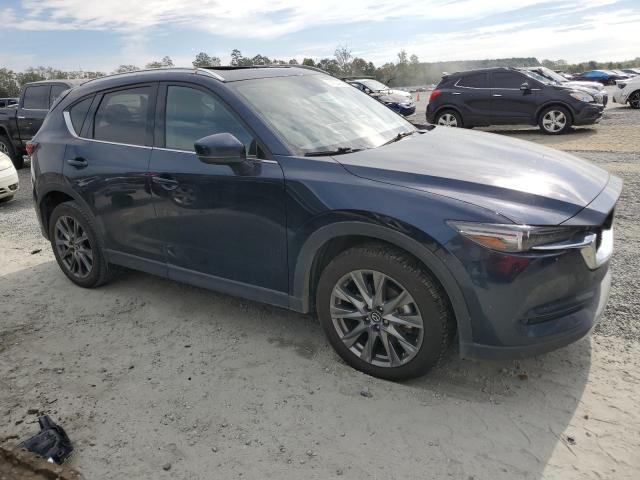 Photo 4 from auction – 2021 MAZDA CX-5 SIGNA with VIN JM3KFBEY3M0439658