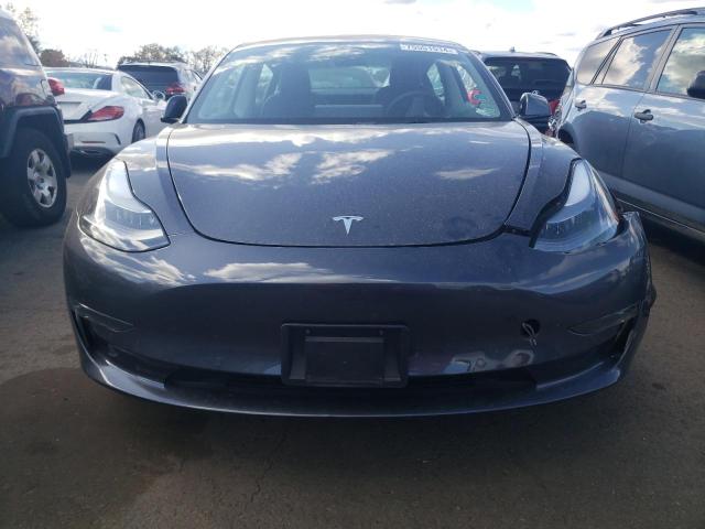 Photo 5 from auction – 2022 TESLA MODEL 3 with VIN 5YJ3E1EBXNF178246