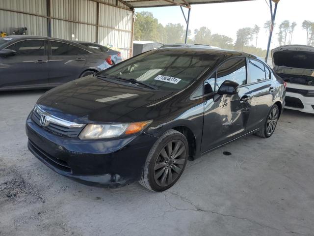 HONDA CIVIC LX 2012 with VIN 19XFB2F54CE072849 - Photo from auction