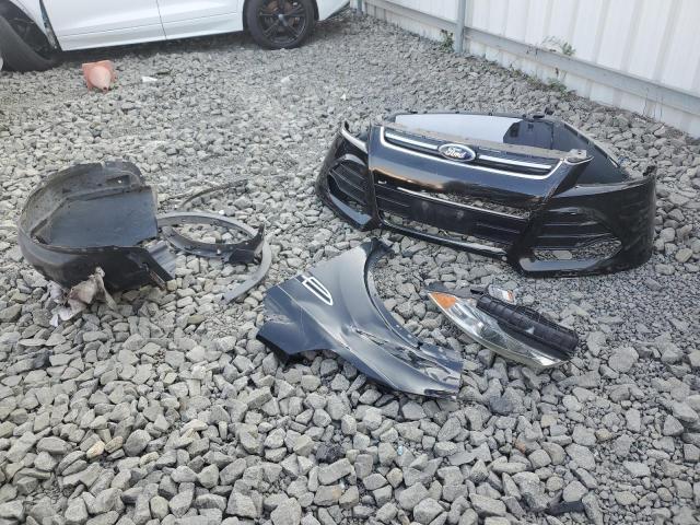 Photo 13 from auction – 2015 FORD ESCAPE TIT with VIN 1FMCU9J93FUA97338