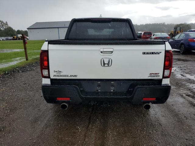 Photo 6 from auction – 2021 HONDA RIDGELINE with VIN 5FPYK3F14MB001150