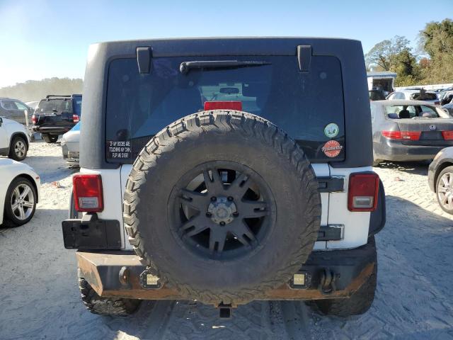Photo 6 from auction – 2012 JEEP WRANGLER U with VIN 1C4BJWDG0CL252401