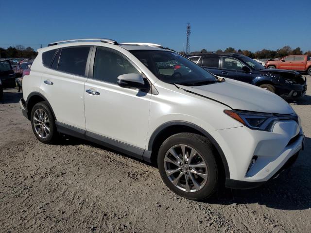 Photo 4 from auction – 2016 TOYOTA RAV4 LIMIT with VIN JTMDFREV1GD184053