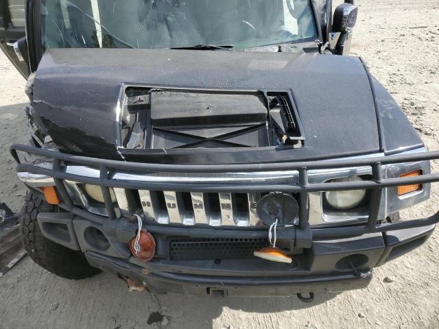 Photo 11 from auction – 2003 HUMMER H2 with VIN 5GRGN23U73H125110