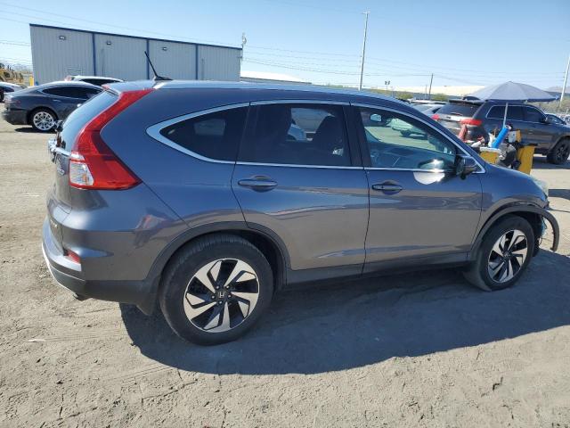 Photo 3 from auction – 2016 HONDA CR-V TOURI with VIN 5J6RM4H98GL013314