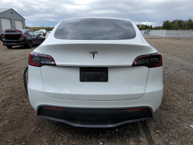 Photo 6 from auction – 2023 TESLA MODEL Y with VIN LRWYGDFD5PC967631