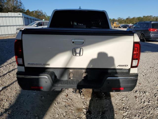 Photo 6 from auction – 2019 HONDA RIDGELINE with VIN 5FPYK3F73KB020029