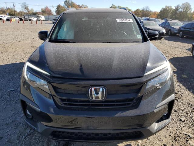 Photo 5 from auction – 2022 HONDA PILOT TRAI with VIN 5FNYF6H81NB031460