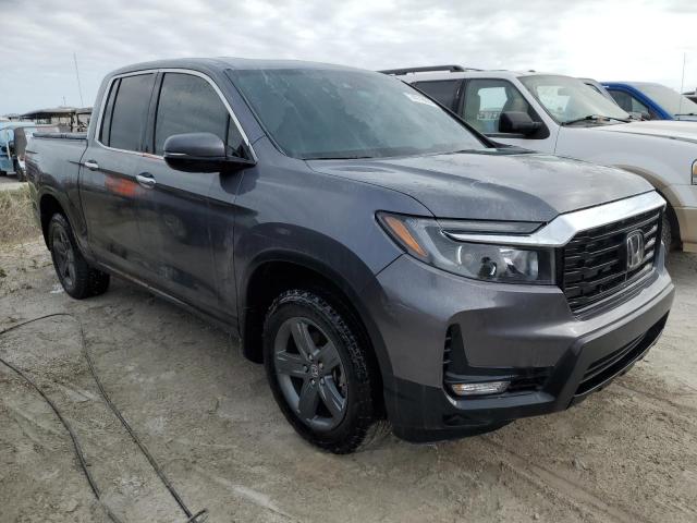 Photo 4 from auction – 2023 HONDA RIDGELINE with VIN 5FPYK3F78PB065636
