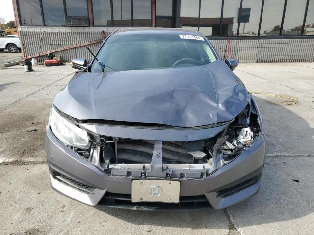 Photo 5 from auction – 2017 HONDA CIVIC EX with VIN 19XFC2F77HE077520