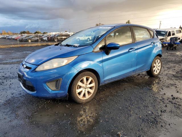 FORD FIESTA SE 2011 with VIN 3FADP4EJ7BM102665 - Photo from auction