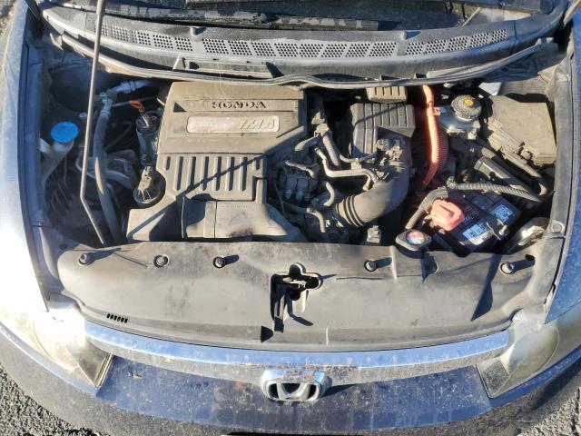 Photo 11 from auction – 2006 HONDA CIVIC HYBR with VIN JHMFA36216S030766