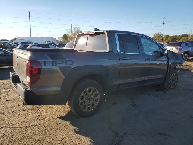 Photo 3 from auction – 2023 HONDA RIDGELINE with VIN 5FPYK3F51PB022206
