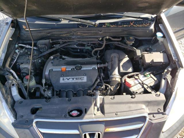 Photo 12 from auction – 2006 HONDA CR-V LX with VIN JHLRD68566C007141