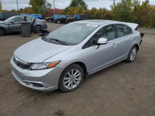 HONDA CIVIC LX 2012 with VIN 2HGFB2F55CH033242 - Photo from auction