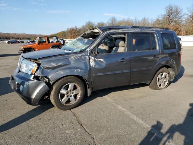 HONDA PILOT EXL 2011 with VIN 5FNYF4H57BB087957 - Photo from auction