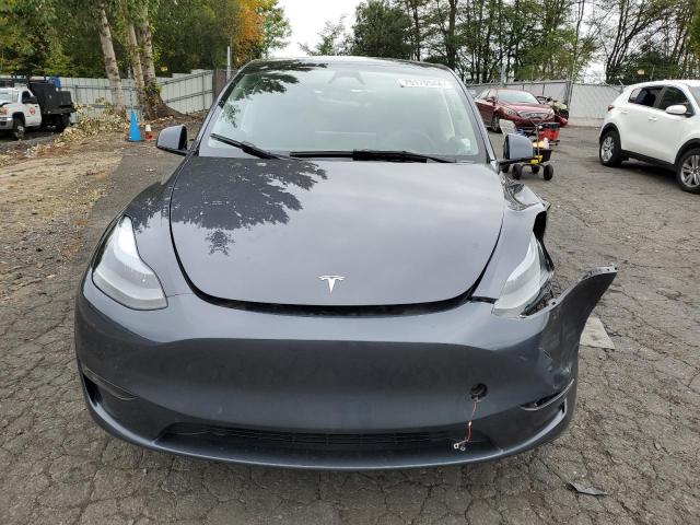 Снимка 5 от търг – 2023 TESLA MODEL Y с VIN 7SAYGDEE6PF904993
