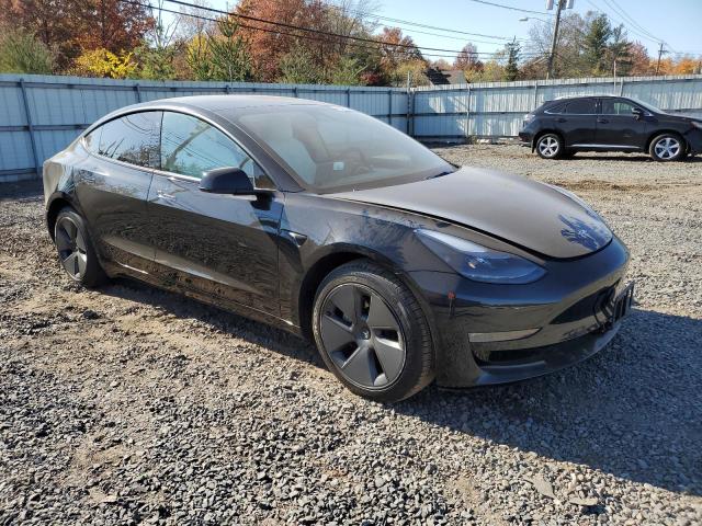 Photo 4 from auction – 2022 TESLA MODEL 3 with VIN 5YJ3E1EB8NF110785