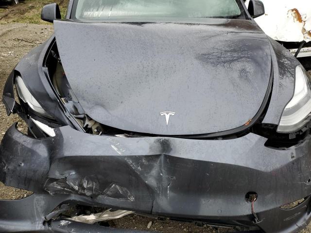 Photo 11 from auction – 2023 TESLA MODEL Y with VIN 7SAYGDEE8PF592918