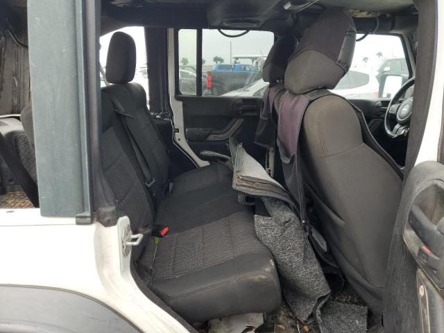 Foto 10 de la subasta – 2011 JEEP WRANGLER U con VIN 1J4BA3H12BL581209