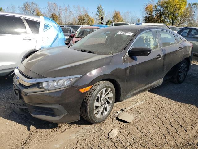 HONDA CIVIC EX 2017 with VIN 19XFC2F73HE046121 - Photo from auction