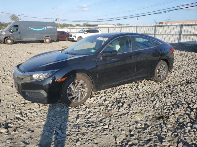 HONDA CIVIC EX 2018 with VIN 2HGFC2F70JH534339 - Photo from auction