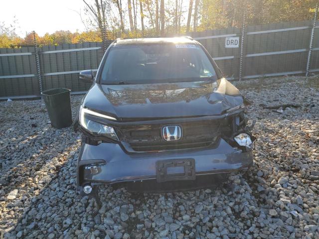 Photo 5 from auction – 2022 HONDA PILOT SE with VIN 5FNYF6H25NB056308