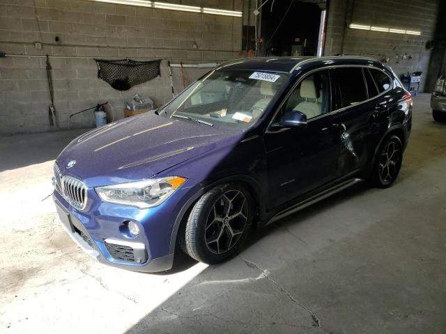 BMW X1 XDRIVE2 2017 with VIN WBXHT3C3XH5F74594 - Photo from auction