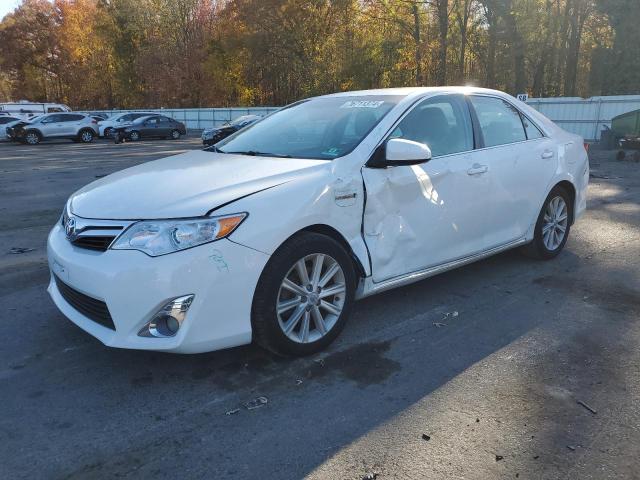 TOYOTA CAMRY HYBR 2012 with VIN 4T1BD1FK6CU032634 - Photo from auction