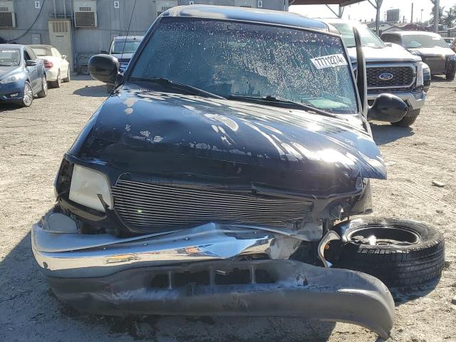 Photo 5 from auction – 2000 FORD F150 with VIN 1FTRX17L3YKA23961