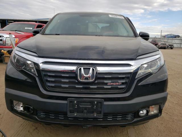 Photo 5 from auction – 2019 HONDA RIDGELINE with VIN 5FPYK3F11KB011891