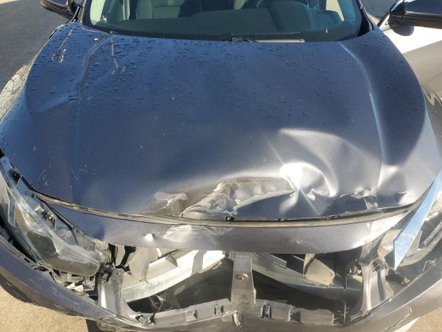 Photo 11 from auction – 2018 HONDA CIVIC EX with VIN 2HGFC2F7XJH593057