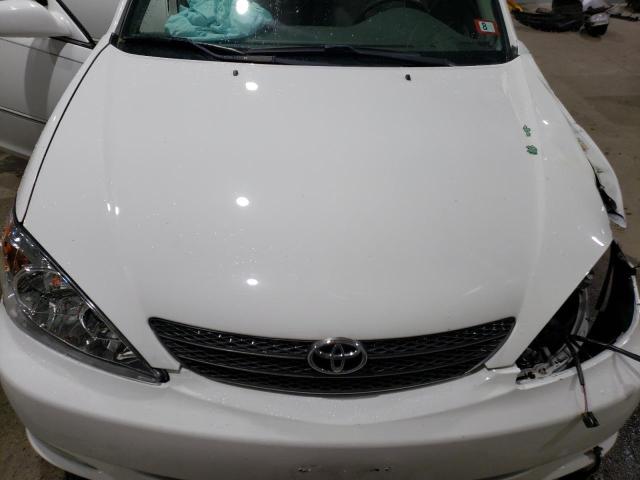 Photo 11 from auction – 2003 TOYOTA CAMRY LE with VIN 4T1BE30K73U245562