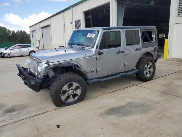 JEEP WRANGLER U 2016 with VIN 1C4HJWEGXGL247611 - Photo from auction