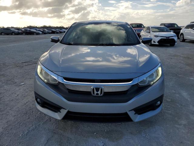 Photo 5 from auction – 2017 HONDA CIVIC EXL with VIN 2HGFC3B73HH354701