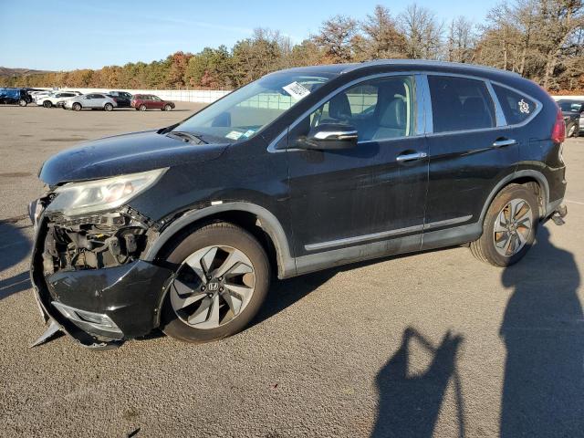 Photo 1 from auction – 2015 HONDA CR-V TOURI with VIN 5J6RM4H91FL063390