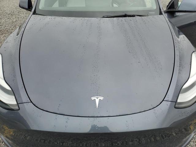 Photo 11 from auction – 2022 TESLA MODEL Y with VIN 7SAYGDEE4NF311825