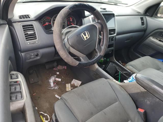 Photo 8 from auction – 2006 HONDA PILOT LX with VIN 2HKYF18126H549036