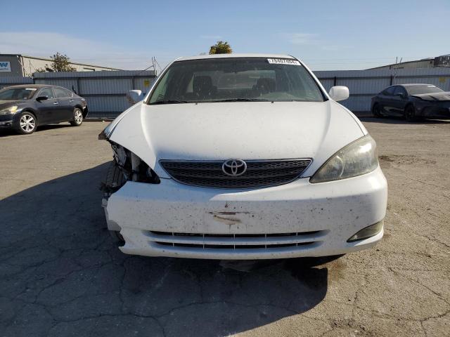 Photo 5 from auction – 2003 TOYOTA CAMRY LE with VIN 4T1BF32K03U050803