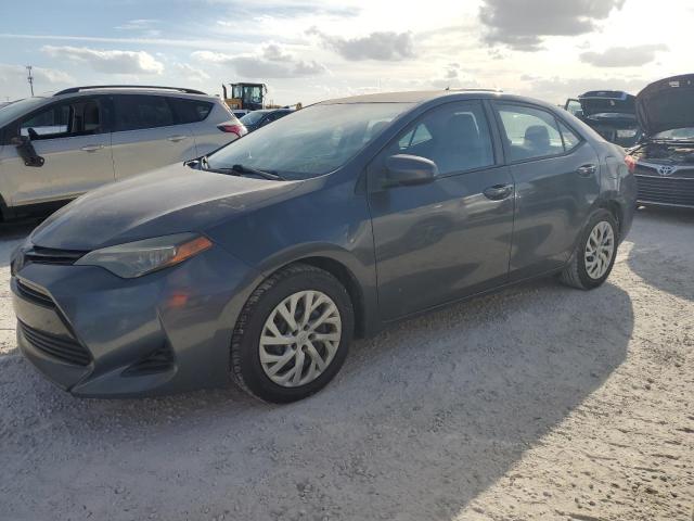 TOYOTA COROLLA L 2017 with VIN 5YFBURHE9HP697462 - Photo from auction